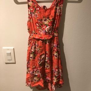 Coral dress with open back. Perfect for summer